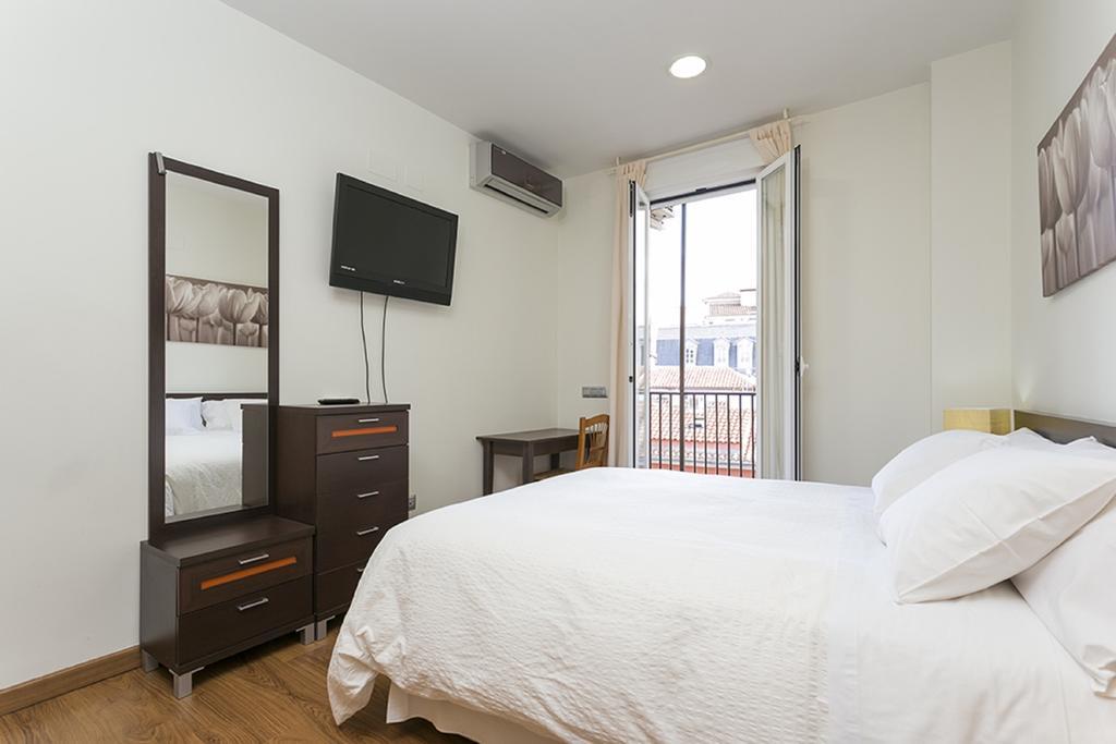 Apartments Center Madrid Pokoj fotografie